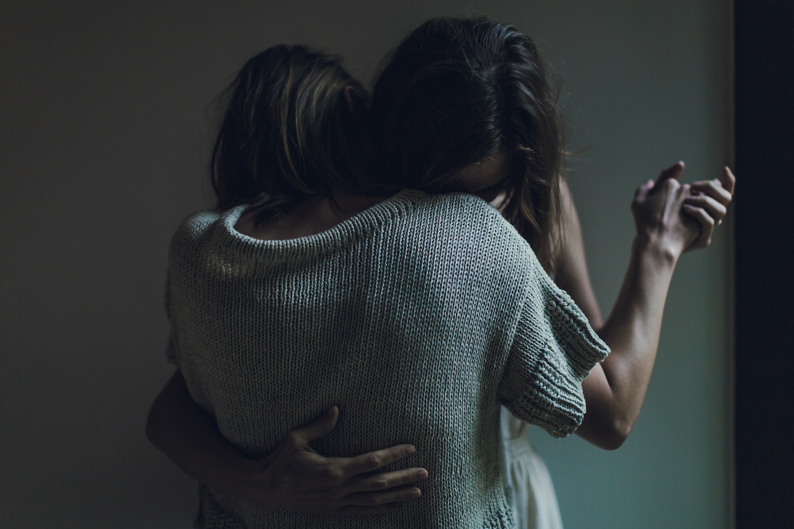 two women hugging each other Dance Classes for Seniors