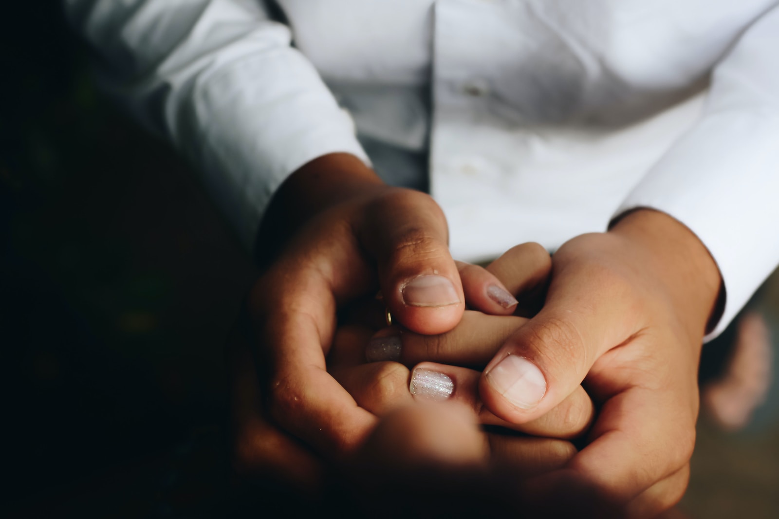 person holding hands Self-Care for Caregivers