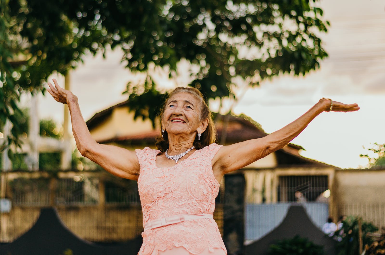 Woman Raising Her Both Hands Understanding Hypnotherapy